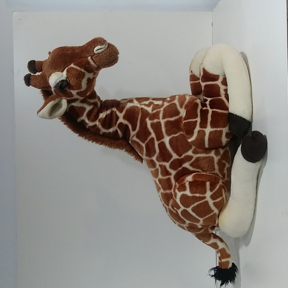 FAO Schwarz laying down baby giraffe stuffie like new